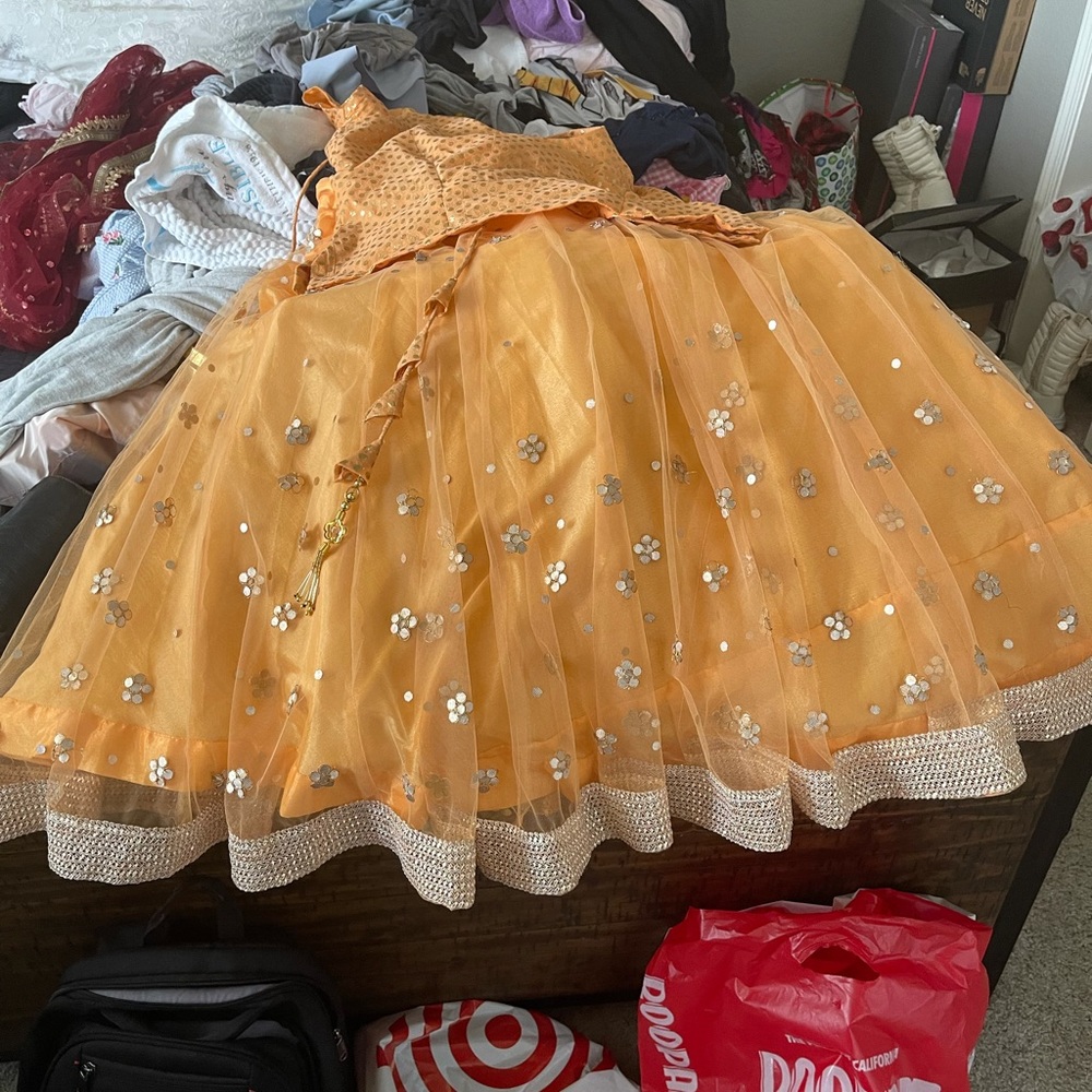 Lengha with short skirt.